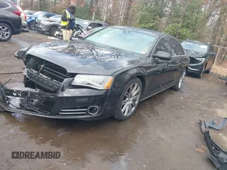 2012 Audi A8 L with VIN WAURVAFD8CN006917, listed as a IAAI auction lot 40877090 with 144,387 mi miles. Bid and sale history available at carsss.com. Image 17.