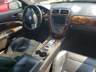 2010 Jaguar XK with VIN SAJWA4DC2AMB34042, listed as a Copart auction lot 65043694 with 0 mi miles and Non Repairable. Bid and sale history available at carsss.com. Image 8.
