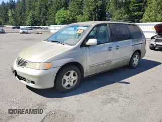 2001 Honda Odyssey EX z VIN 2HKRL18761H542195, wystawiony jako Copart lot #58277125 z przebiegiem 201 340 mil mil oraz Czysty tytuł • Clean title. Historia ofert i sprzedaży dostępna na DreamBid. Obrazek 1.