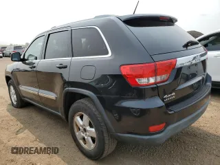 2011 Jeep Grand Cherokee Laredo with VIN 1J4RR4GGXBC567450, listed as a Copart auction lot 60056085 with 165,077 mi miles and Salvage title. Bid and sale history available at DreamBid. Image 2.
