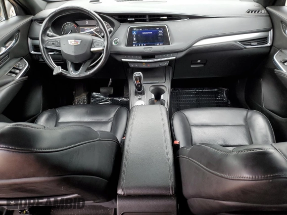 2021 Cadillac XT4 AWD Premium Luxury z VIN 1GYFZDR4XMF000937, wystawiony jako Copart lot #52406055 z przebiegiem 46 881 mil mil oraz Szkody całkowita. Historia ofert i sprzedaży dostępna na DreamBid. Obrazek 8.