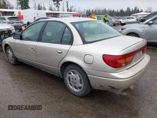 2002 Saturn SL with VIN 1G8ZK52732Z274875, listed as a IAAI auction lot 41911548 with 266,181 mi miles. Bid and sale history available at carsss.com. Image 3.