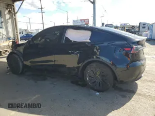 2024 Tesla Model Y Long Range z VIN 7SAYGDEE1RA247973, wystawiony jako Copart lot #45679205 z przebiegiem 22 739 mil mil oraz Szkoda całkowita • Salvage title. Historia ofert i sprzedaży dostępna na DreamBid. Obrazek 2.