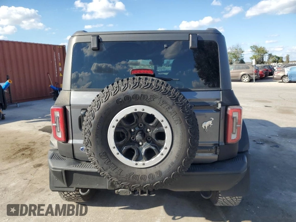 2022 Ford Bronco with VIN 1FMEE5DH1NLB82717, listed as a Copart auction lot 83230614 with 21,593 mi miles and Salvage Title. Bid and sale history available at DreamBid. Image 6.