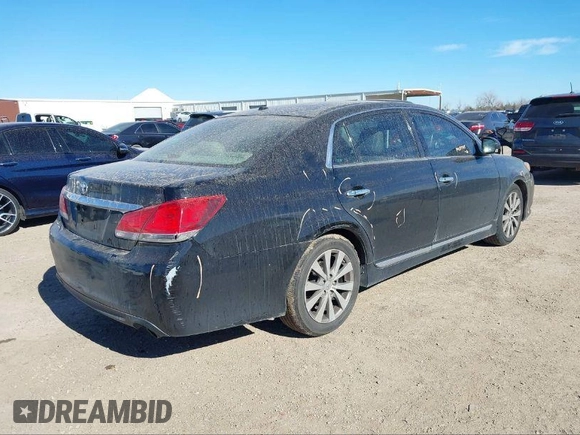 2012 Toyota Avalon with VIN 4T1BK3DB4CU442885, listed as a IAAI auction lot 40713053 with 144,383 mi miles and . Bid and sale history available at DreamBid. Image 4.
