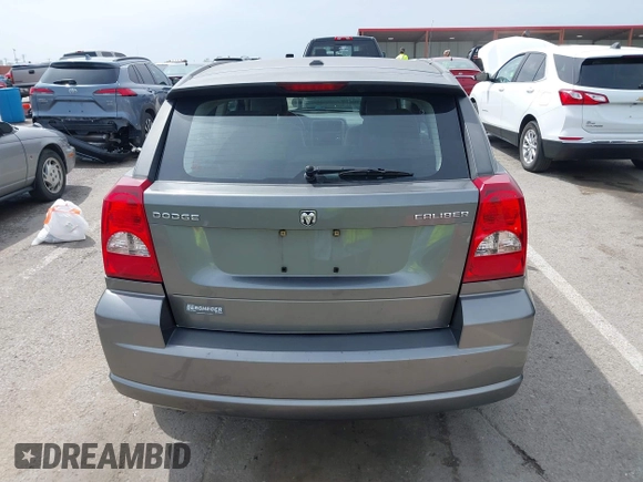 2012 Dodge Caliber SXT with VIN 1C3CDWDA6CD506019, listed as a IAAI auction lot 41999560 with 146,446 mi miles and . Bid and sale history available at DreamBid. Image 17.
