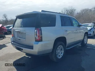 2019 GMC Yukon SLT with VIN 1GKS1BKC5KR277478, listed as a IAAI auction lot 41632624 with 86,770 mi miles. Bid and sale history available at carsss.com. Image 4.