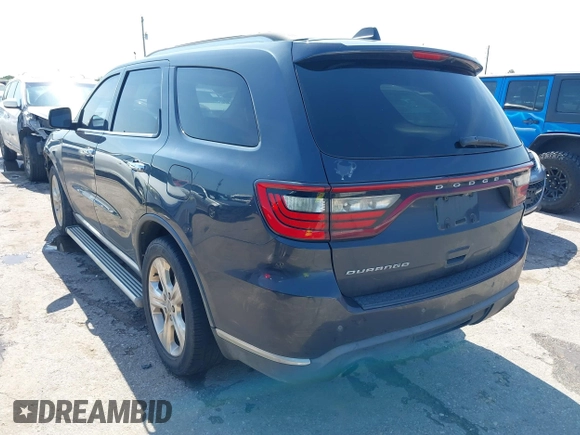 2014 Dodge Durango SXT with VIN 1C4RDHAG3EC594529, listed as a IAAI auction lot 42177560 with 194,036 mi miles and . Bid and sale history available at carsss.com. Image 3.
