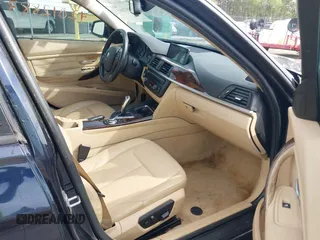 2013 BMW 3 Series 328i xDrive with VIN WBA3B5G53DNS02293, listed as a IAAI auction lot 42012883 with 243,490 mi miles. Bid and sale history available at carsss.com. Image 5.