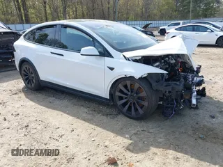 2022 Tesla Model X Plaid z VIN 7SAXCBE6XNF340704, wystawiony jako IAAI lot #41928524 z przebiegiem Nie podano mil oraz . Historia ofert i sprzedaży dostępna na DreamBid. Obrazek 1.