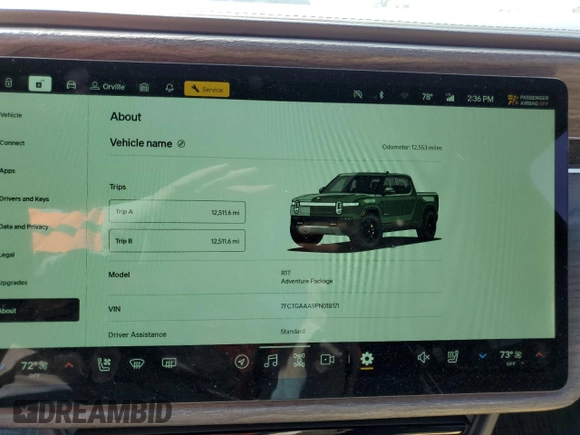 2023 Rivian R1T Adventure z VIN 7FCTGAAA9PN018171, wystawiony jako Copart lot #72593614 z przebiegiem 12 553 mil mil oraz Szkody całkowita. Historia ofert i sprzedaży dostępna na DreamBid. Obrazek 9.