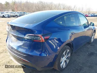 2021 Tesla Model Y Long Range with VIN 5YJYGDEE8MF293230, listed as a IAAI auction lot 41744033 with 56,797 mi miles and . Bid and sale history available at DreamBid. Image 19.