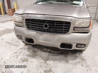 1999 Cadillac Escalade z VIN 1GYEK13RXXR413480, wystawiony jako IAAI lot #41552688 z przebiegiem 214 501 mil mil oraz . Historia ofert i sprzedaży dostępna na DreamBid. Obrazek 6.