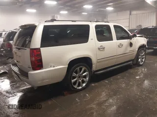 2010 Chevrolet Suburban LTZ with VIN 1GNUKKE32AR271253, listed as a IAAI auction lot 41161374 with 164,184 mi miles. Bid and sale history available at carsss.com. Image 4.