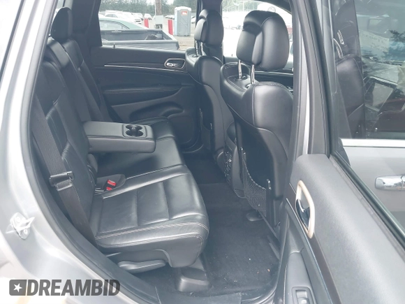 2014 Jeep Grand Cherokee Limited z VIN 1C4RJFBG8EC541921, wystawiony jako IAAI lot #41903574 z przebiegiem 133 679 mil mil oraz . Historia ofert i sprzedaży dostępna na DreamBid. Obrazek 8.