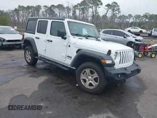 2022 Jeep Wrangler Unlimited Sport with VIN 1C4HJXDN2NW251041, listed as a IAAI auction lot 41558677 with 61,120 mi miles and . Bid and sale history available at DreamBid. Image 1.