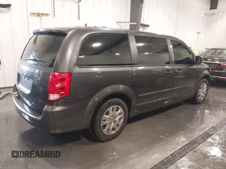 2015 Dodge Grand Caravan SE with VIN 2C4RDGBG2FR643477, listed as a IAAI auction lot 41955909 with 451,432 mi miles and . Bid and sale history available at DreamBid. Image 4.