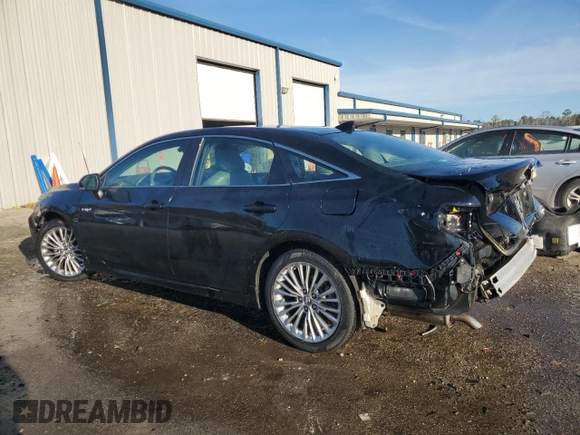 2019 Toyota Avalon Limited Hybrid z VIN 4T1B21FB3KU008344, wystawiony jako Copart lot #84662964 z przebiegiem 127 254 mil mil oraz Szkoda całkowita • Salvage title. Historia ofert i sprzedaży dostępna na DreamBid. Obrazek 2.