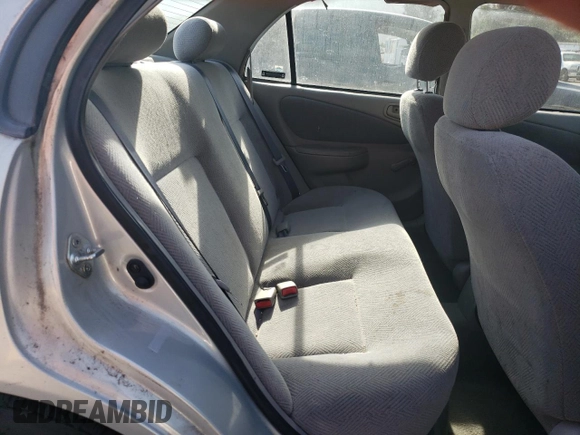 2001 Chevrolet Prizm z VIN 1Y1SK52811Z447352, wystawiony jako Copart lot #73916394 z przebiegiem 89 265 mil mil oraz Szkoda całkowita • Salvage title. Historia ofert i sprzedaży dostępna na DreamBid. Obrazek 10.