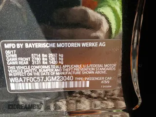 2018 BMW 7 Series 750i with VIN WBA7F0C57JGM23040, listed as a Copart auction lot 87392704 with 0 mi miles and Salvage Title. Bid and sale history available at carsss.com. Image 12.