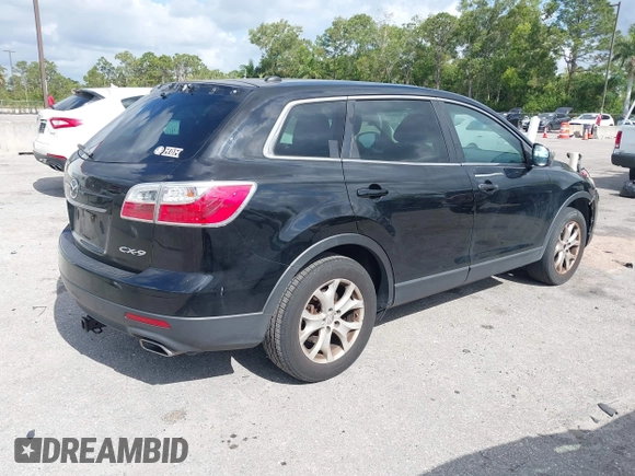 2012 Mazda CX-9 Touring with VIN JM3TB2CA7C0351670, listed as a IAAI auction lot 42148313 with 248,799 mi miles and . Bid and sale history available at DreamBid. Image 4.