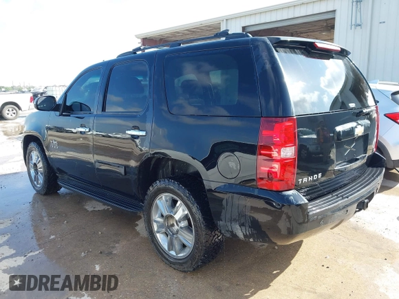 2011 Chevrolet Tahoe LS with VIN 1GNSCAE05BR380084, listed as a IAAI auction lot 42746873 with 386,755 mi miles and . Bid and sale history available at DreamBid. Image 3.