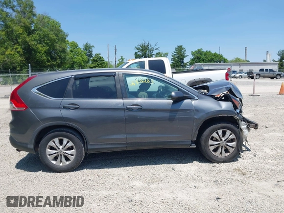 2013 Honda CR-V EX z VIN 2HKRM4H5XDH604442, wystawiony jako IAAI lot #42403283 z przebiegiem 163 870 mil mil oraz . Historia ofert i sprzedaży dostępna na DreamBid. Obrazek 14.