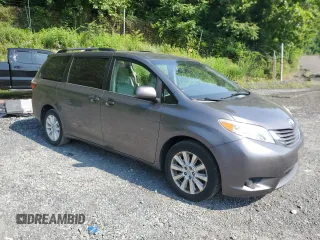 2015 Toyota Sienna LE with VIN 5TDJK3DC0FS112243, listed as a Copart auction lot 61791405 with 86,039 mi miles and Salvage title. Bid and sale history available at DreamBid. Image 4.