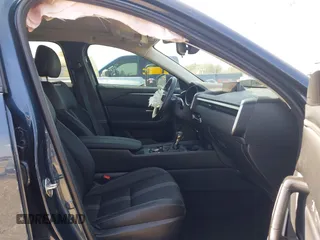 2023 Mazda CX-50 S Preferred Plus с VIN 7MMVABCM2PN129237, выставлен на аукционе IAAI как лот 41584165 с пробегом 43 174 миль миль и . История ставок и продаж доступна на DreamBid. Изображение 5.