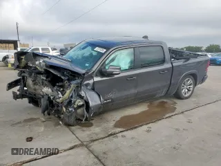 2020 Ram 1500 Laramie with VIN 1C6SRFJT1LN355834, listed as a Copart auction lot 57878305 with Not provided miles and Salvage title. Bid and sale history available at DreamBid. Image 1.