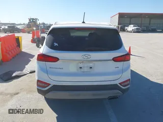 2019 Hyundai Santa Fe SE with VIN 5NMS2CAD4KH118545, listed as a IAAI auction lot 41686797 with 54,108 mi miles and . Bid and sale history available at DreamBid. Image 16.