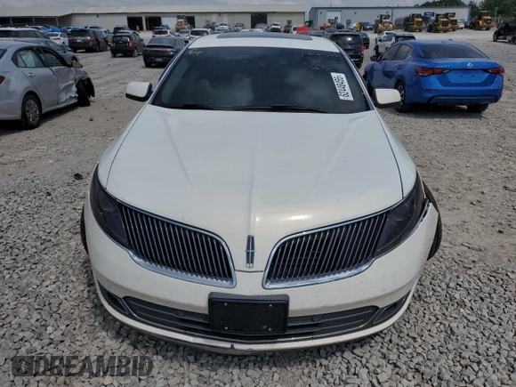 2013 Lincoln MKS with VIN 1LNHL9EK8DG605675, listed as a Copart auction lot 62448455 with 102,642 mi miles and Salvage title. Bid and sale history available at DreamBid. Image 5.