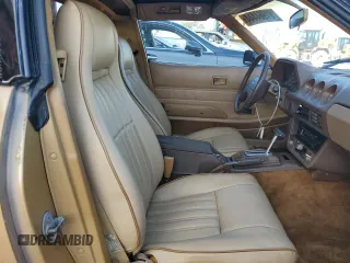 1980 Datsun 280ZX z VIN HS130221335, wystawiony jako Copart lot #81964444 z przebiegiem 135 266 mil mil oraz Szkody całkowita. Historia ofert i sprzedaży dostępna na DreamBid. Obrazek 10.