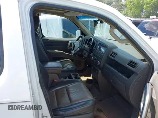 2006 Honda Ridgeline RTL z VIN 2HJYK16506H512654, wystawiony jako IAAI lot #42245264 z przebiegiem 303 551 mil mil oraz . Historia ofert i sprzedaży dostępna na DreamBid. Obrazek 5.
