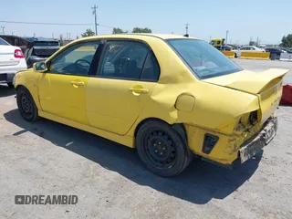 2002 Mitsubishi Lancer OZ-Rally z VIN JA3AJ86EX2U073129, wystawiony jako IAAI lot #42337379 z przebiegiem 257 556 mil mil oraz . Historia ofert i sprzedaży dostępna na DreamBid. Obrazek 3.