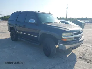 2005 Chevrolet Tahoe LT z VIN 1GNEK13T45R261928, wystawiony jako IAAI lot #42240287 z przebiegiem 247 757 mil mil oraz . Historia ofert i sprzedaży dostępna na DreamBid. Obrazek 1.