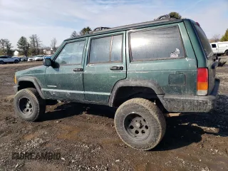 1999 Jeep Cherokee SE with VIN 1J4FF28S3XL551875, listed as a Copart auction lot 43057555 with 226,794 mi miles and Salvage title. Bid and sale history available at DreamBid. Image 2.