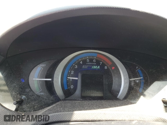 2010 Honda Insight LX z VIN JHMZE2H56AS008077, wystawiony jako Copart lot #60522045 z przebiegiem 105 936 mil mil oraz Szkoda całkowita • Salvage title. Historia ofert i sprzedaży dostępna na DreamBid. Obrazek 9.
