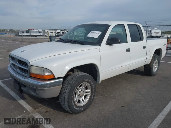 2004 Dodge Dakota SLT with VIN 1D7HG48N44S524998, listed as a IAAI auction lot 42195420 with 197,530 mi miles and . Bid and sale history available at DreamBid. Image 2.