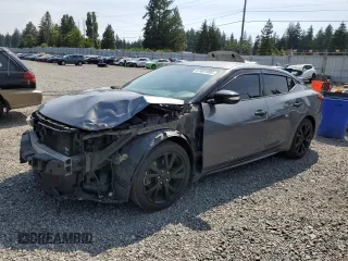 2017 Nissan Maxima Platinum with VIN 1N4AA6AP7HC381605, listed as a Copart auction lot 61601995 with 125,466 mi miles and Salvage title. Bid and sale history available at DreamBid. Image 1.