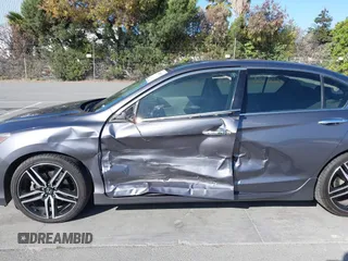 2017 Honda Accord Touring with VIN 1HGCR3F97HA030310, listed as a IAAI auction lot 42539852 with 64,849 mi miles and . Bid and sale history available at DreamBid. Image 6.