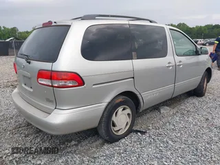 2002 Toyota Sienna LE with VIN 4T3ZF13C92U434076, listed as a IAAI auction lot 42132585 with 243,661 mi miles and . Bid and sale history available at DreamBid. Image 4.