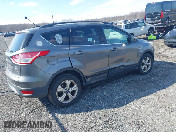 2014 Ford Escape SE with VIN 1FMCU9G98EUD26411, listed as a IAAI auction lot 41686493 with 132,644 mi miles. Bid and sale history available at carsss.com. Image 4.