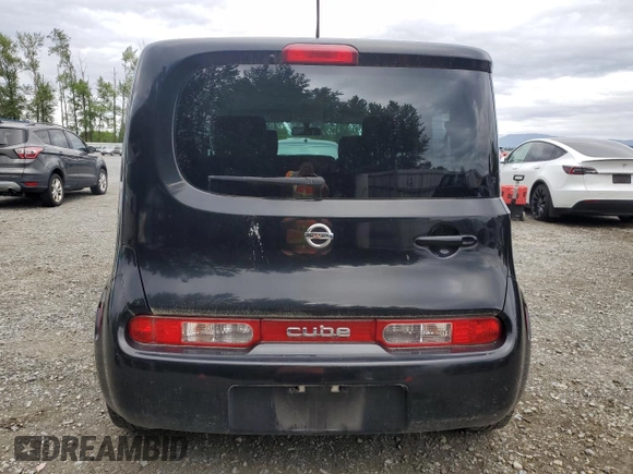 2009 Nissan Cube SL z VIN JN8AZ28RX9T128917, wystawiony jako Copart lot #58941675 z przebiegiem 113 263 mil mil oraz Szkoda całkowita • Salvage title. Historia ofert i sprzedaży dostępna na DreamBid. Obrazek 5.
