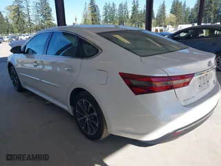 2016 Toyota Avalon Hybrid XLE Premium with VIN 4T1BD1EB2GU048496, listed as a IAAI auction lot 42047633 with 68,900 mi miles. Bid and sale history available at carsss.com. Image 3.
