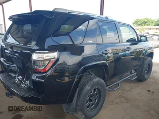 2018 Toyota 4Runner SR5 with VIN JTEBU5JR0J5607121, listed as a IAAI auction lot 42042949 with 156,625 mi miles and . Bid and sale history available at DreamBid. Image 4.