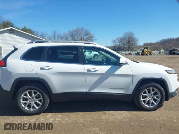 2015 Jeep Cherokee Latitude with VIN 1C4PJMCS8FW624375, listed as a IAAI auction lot 41848679 with 148,130 mi miles and . Bid and sale history available at DreamBid. Image 13.
