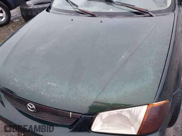 2000 Mazda Protege DX with VIN JM1BJ2225Y0255349, listed as a IAAI auction lot 41604895 with Not Provided miles and . Bid and sale history available at DreamBid. Image 10.
