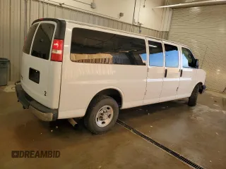 2013 Chevrolet Express Passenger LT with VIN 1GAZG1FG5D1118406, listed as a Copart auction lot 81705434 with 87,326 mi miles and Salvage title. Bid and sale history available at DreamBid. Image 3.