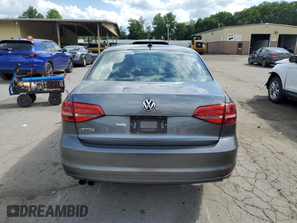 2015 Volkswagen Jetta S with VIN 3VW2K7AJ5FM327788, listed as a Copart auction lot 64034985 with 43,172 mi miles and Salvage title. Bid and sale history available at DreamBid. Image 6.